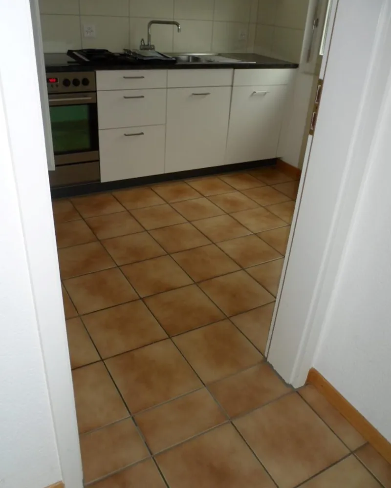 Vorher: Wohnbereich mit Terrakotta-Platten